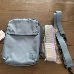 IHKWIP everyday crossbody with 2 straps in faded denim 100% nylon. new with tags